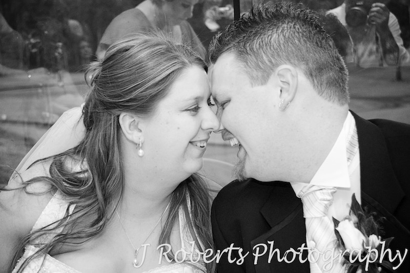 B&W of bride and groom intimate after wedding ceremony - wedding photography sydney